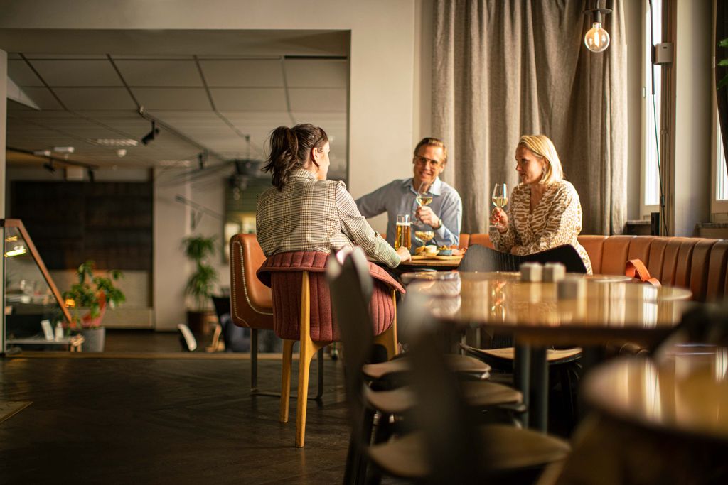 people eating and drinking